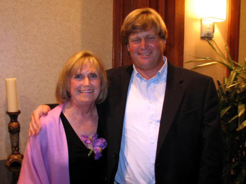 Iris Society of Austin President Marney Abel and her son James